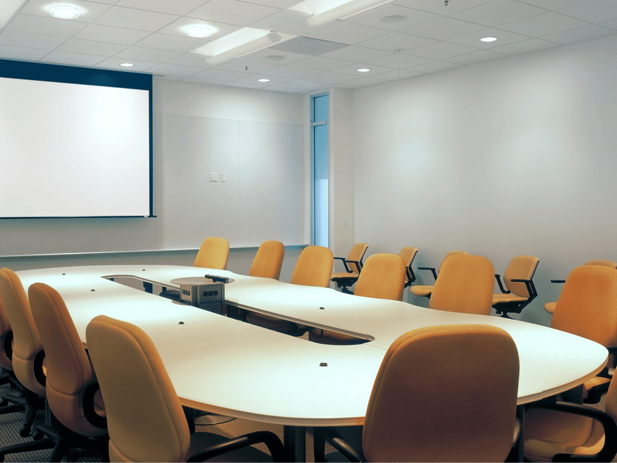 Oval conference room projector screen orange chairs - stock