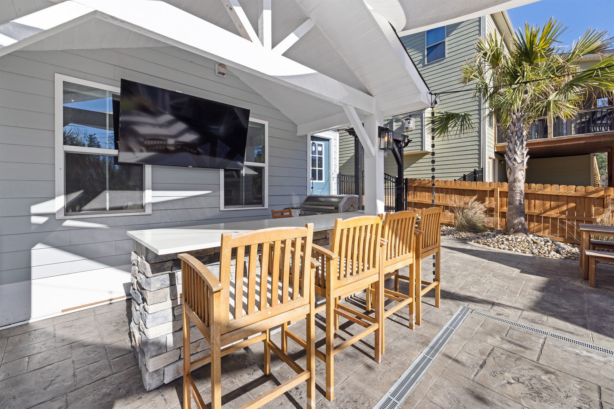 covered-patio-outdoor-tv-bar-stock