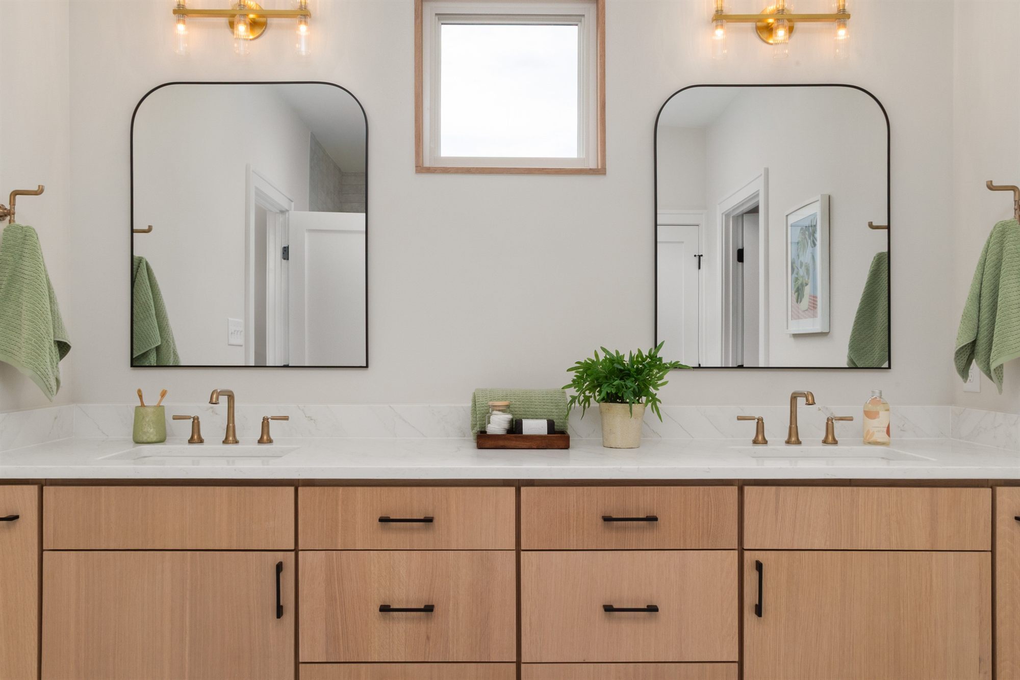 double-vanity-arched-mirrors-bathroom-stock