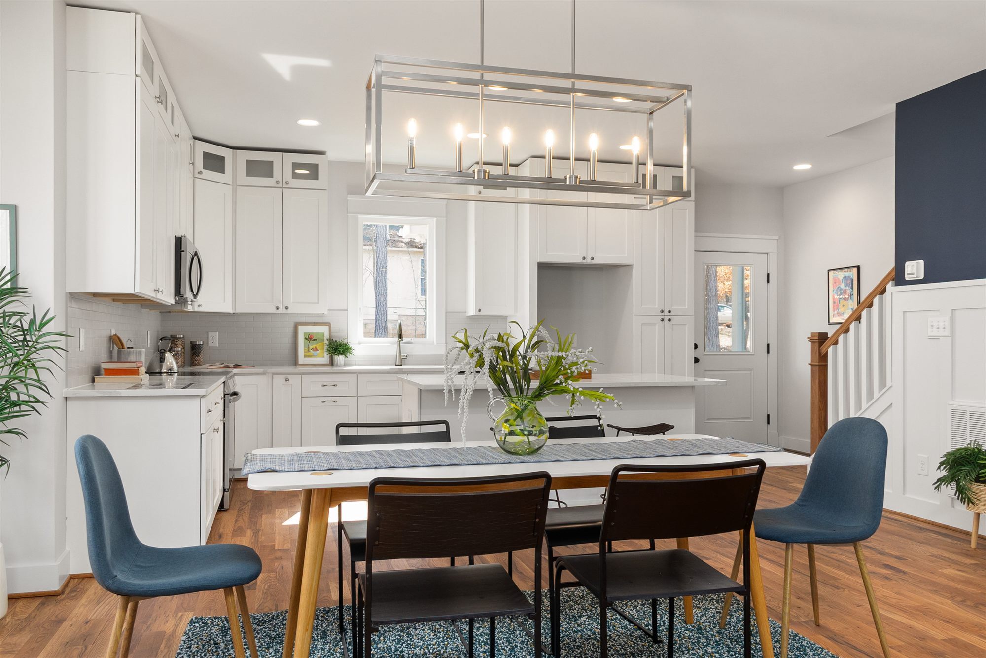 kitchen-dining-room-blue-chairs-stock