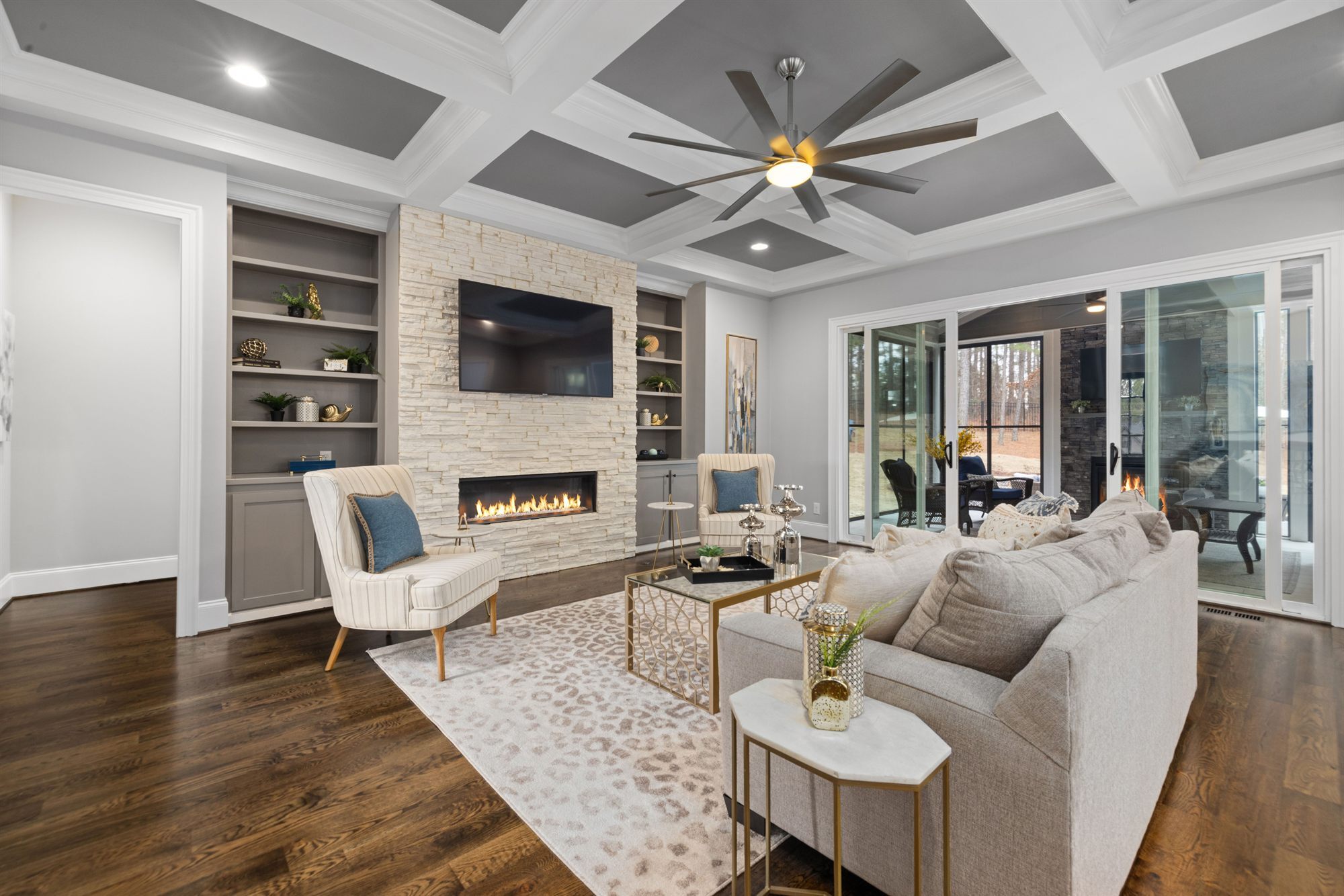 living-room-stone-fireplace-tv-stock