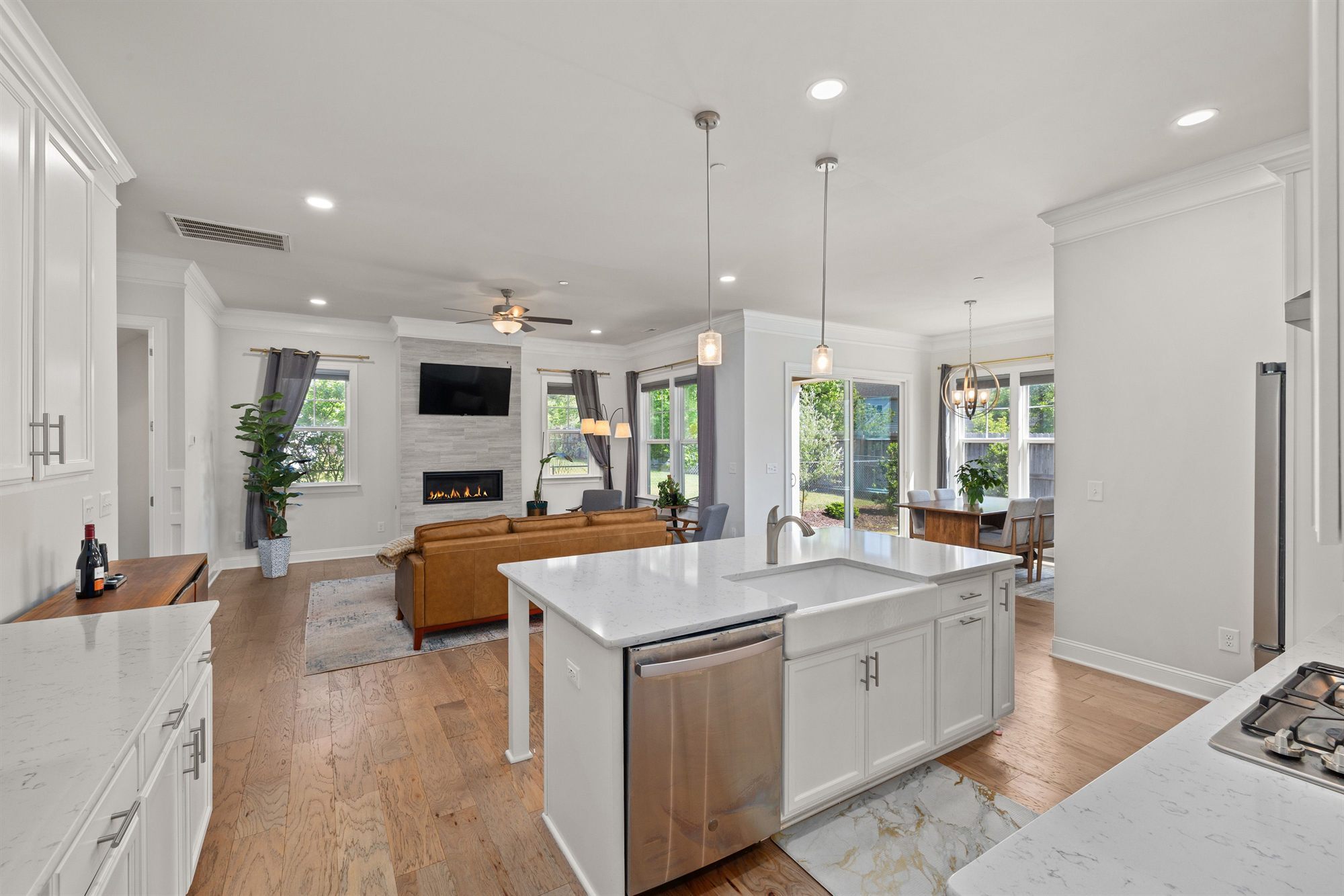 open-concept-living-kitchen-fireplace-stock