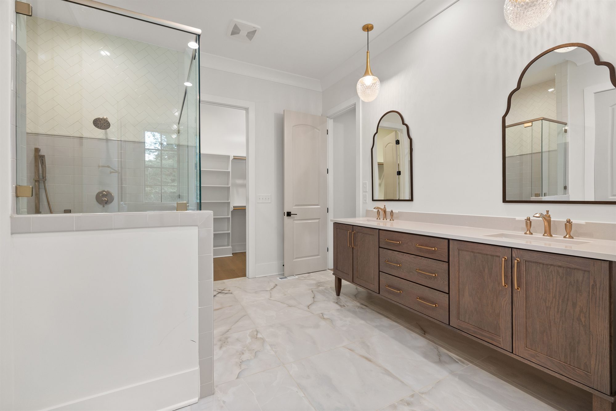 primary-bathroom-shower-double-vanity-stock